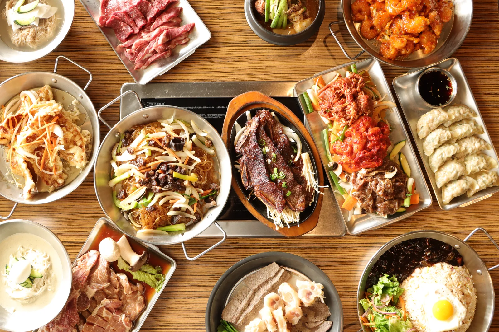 A table of Korean dishes at GAON Burnaby